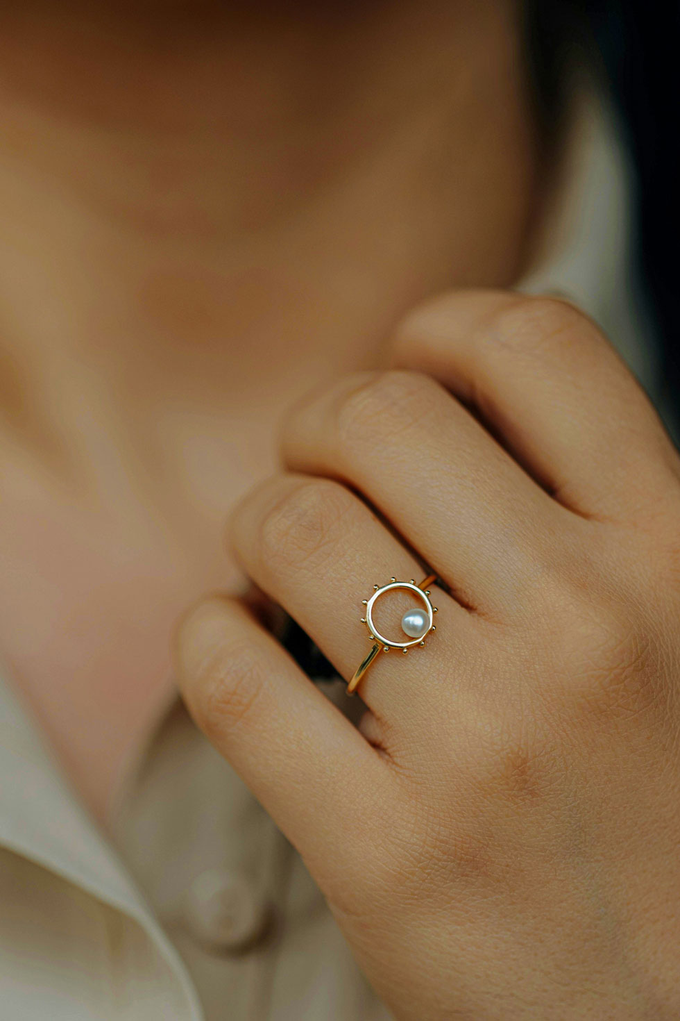 Bague en or avec une perle fine